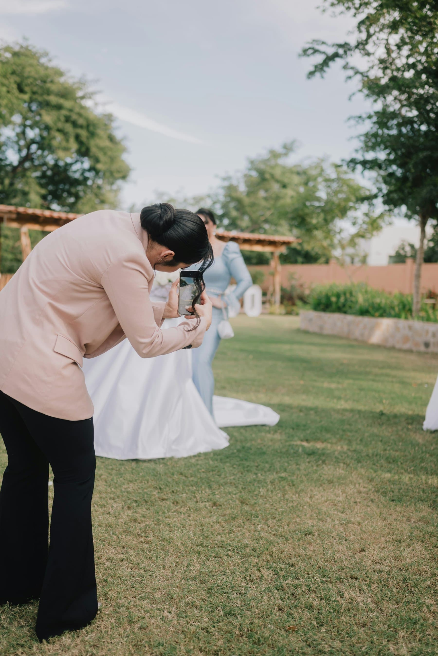 Adjusting a veil in the field, mid-shoot