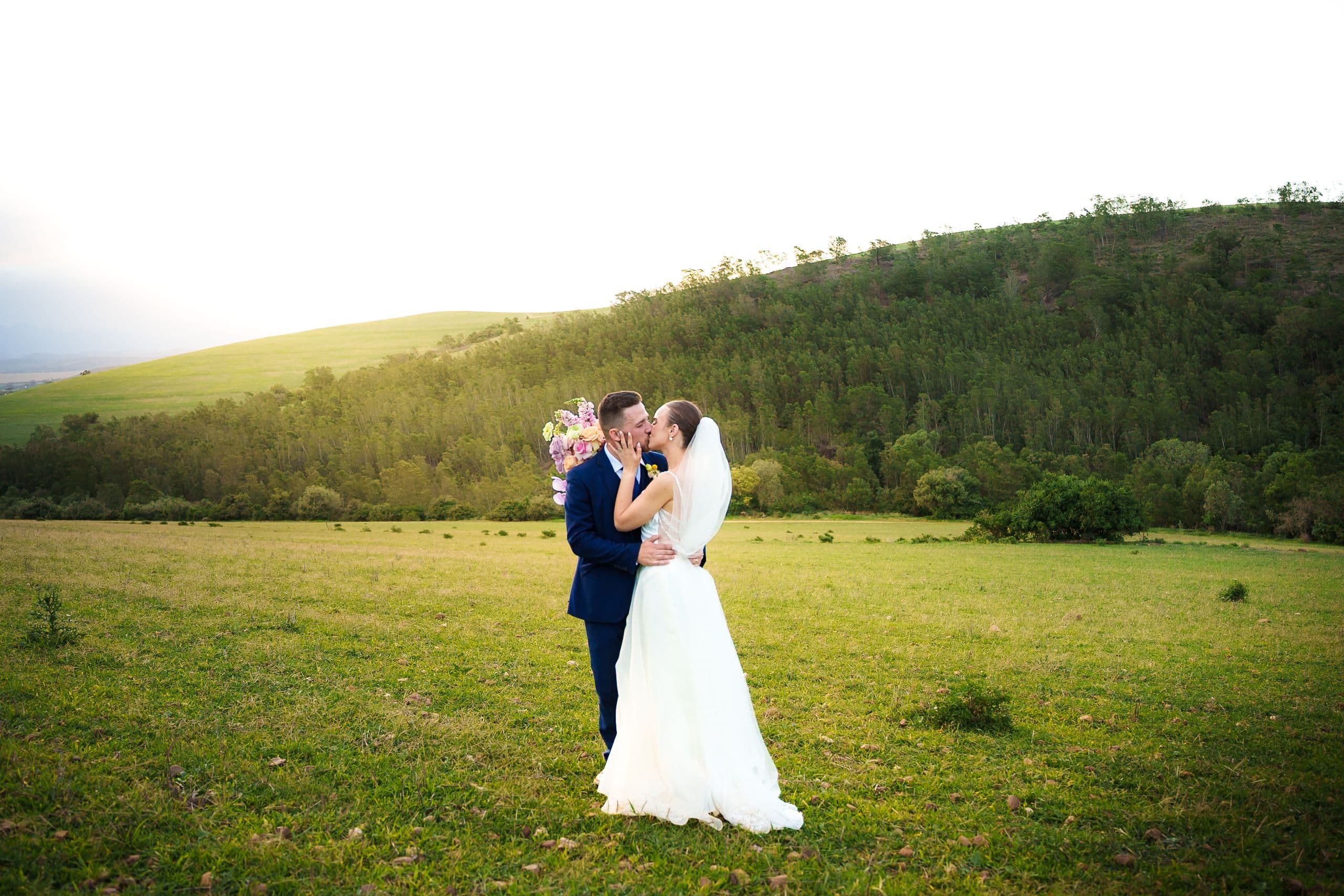 Sofia and Marc close together beneath autumn trees